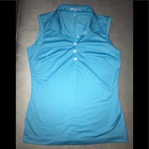 Turquoise blue women’s Nike golf polo shirt